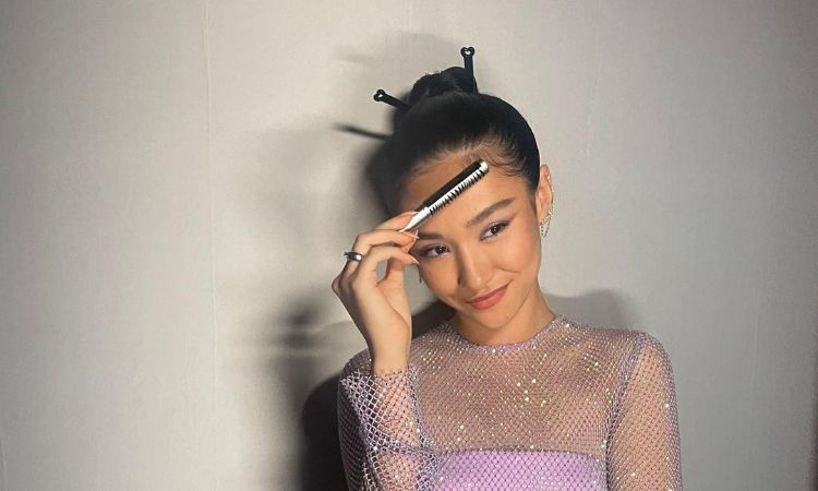 Minie Mills doing a brand endorsement for JOAH Beauty. 